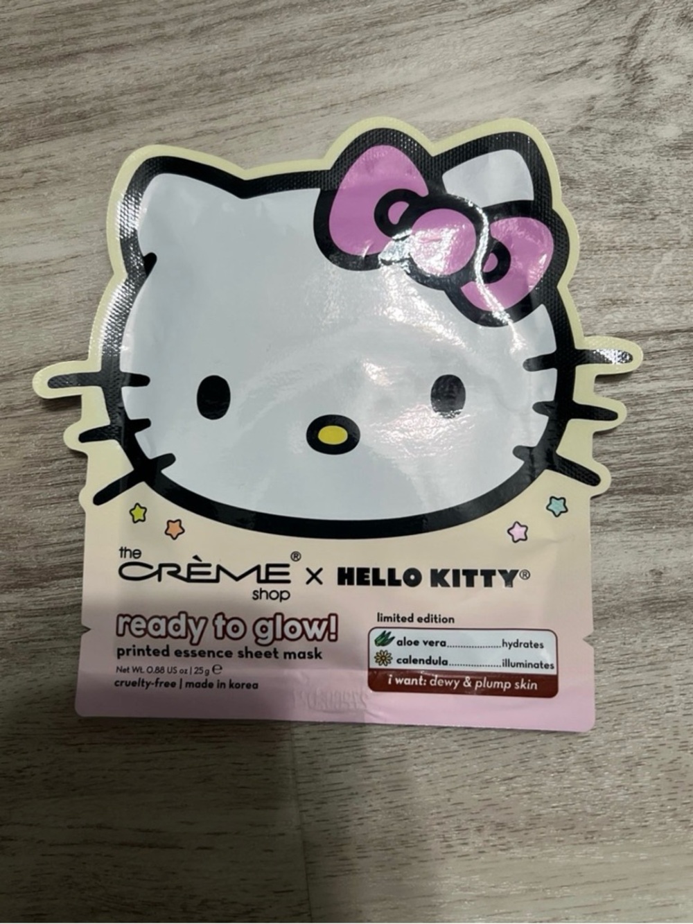 Sanrio Hello Kitty Pink Bow Cream White Face Sheet Mask